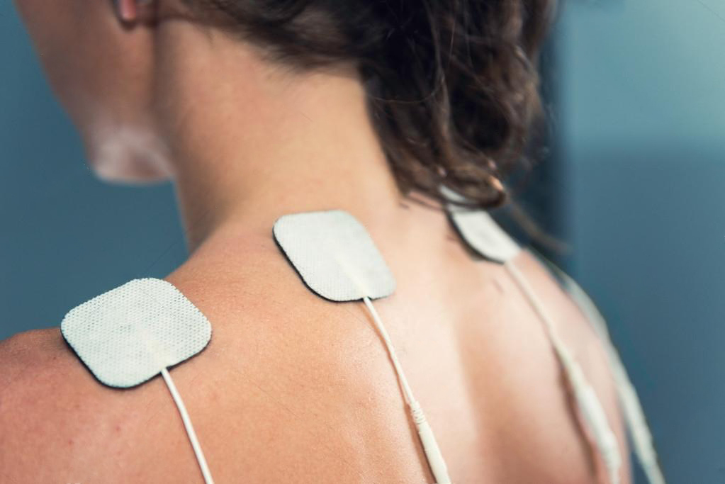 https://neuragenex.com/wp-content/uploads/2023/03/tens-electrodes-on-shoulders-copy.jpg